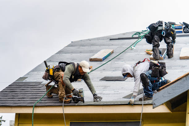 Professional Roofing technician working in Demarest, NJ